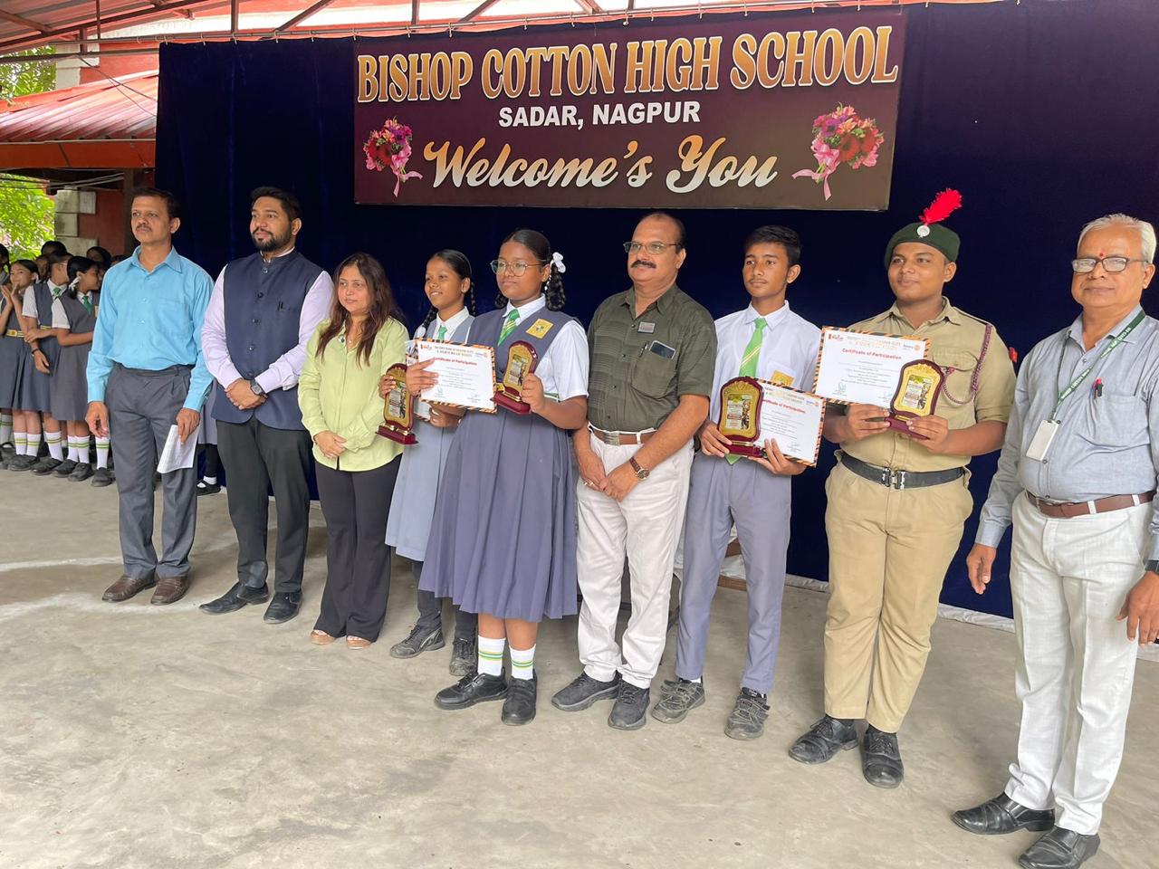 Students participating in a poster making competition for tiger conservation