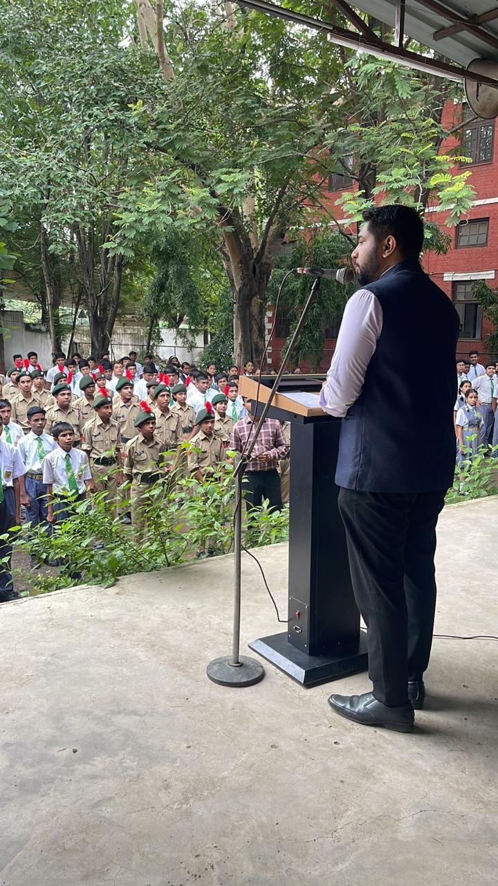 Students listening to a presentation during a school awareness drive